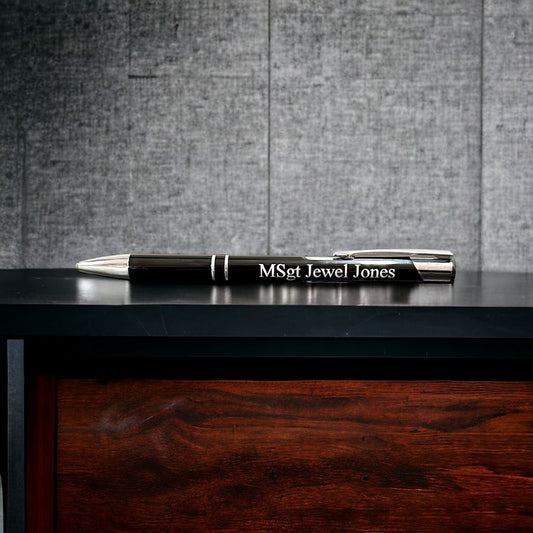 black engraved pen on desk