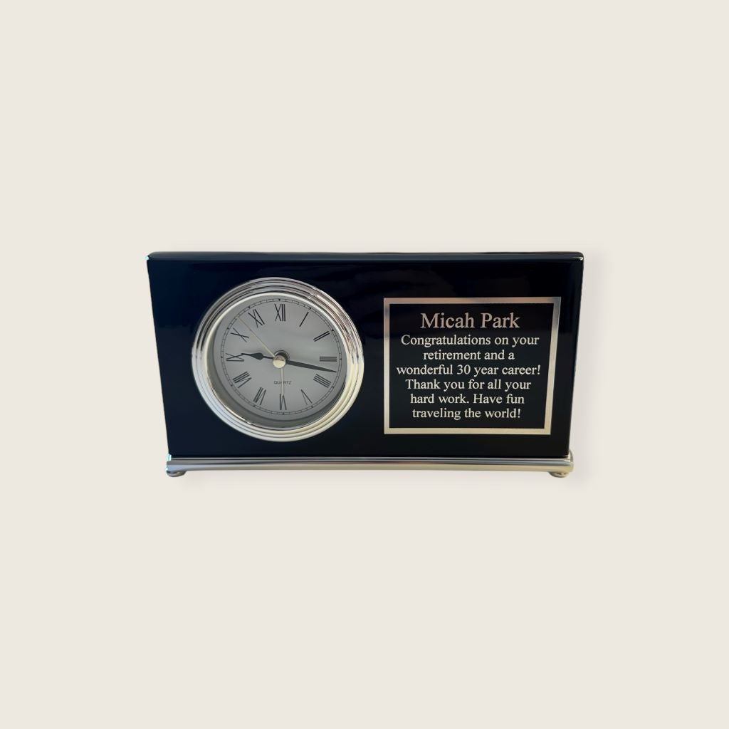 clock with engraved plate