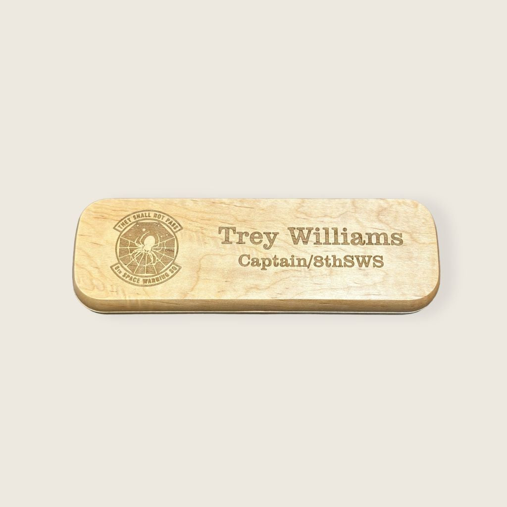 engraved maple pen case display