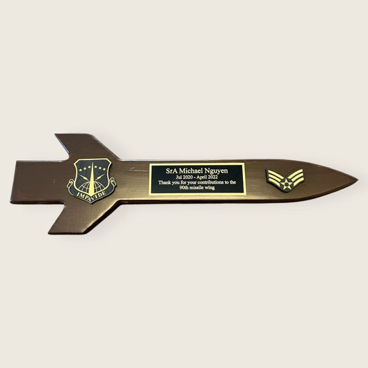 dark pine missile plaque with black and gold wood coins