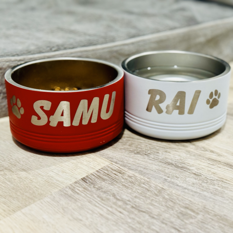 small personalized pet bowls on white floor