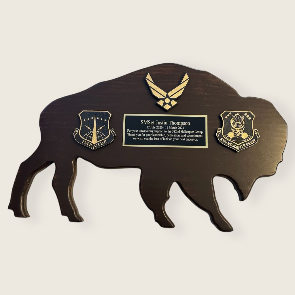 dark pine bison plaque with black and gold wood coins 