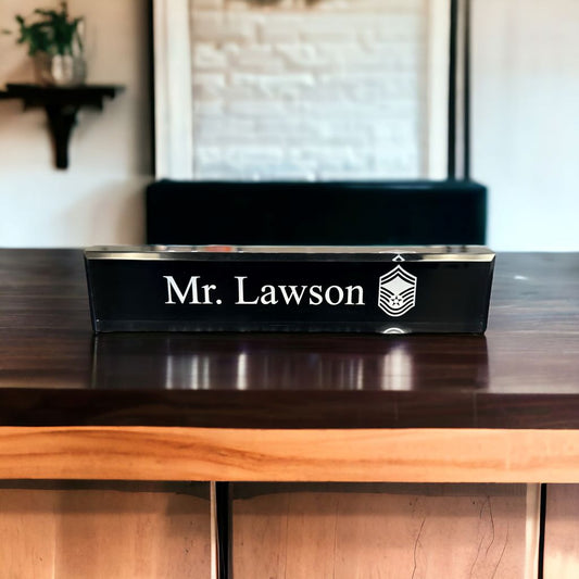 black acrylic desk wedge displayed on a desk