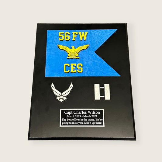 small guidon plaque in black finish with a painted wood guidon, wood coins, and an engraved plate in black and silver color scheme