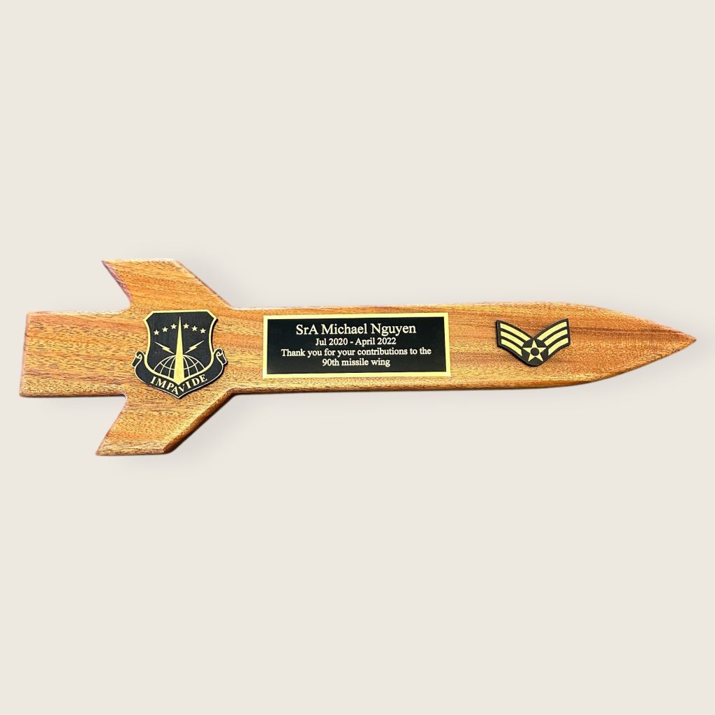 mahogany missile plaque with black and gold wood coins