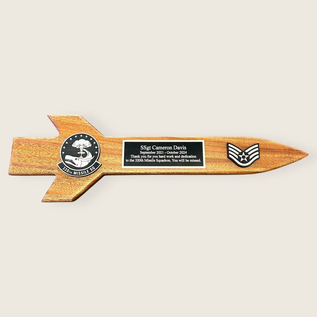 mahogany missile plaque with black and silver wood coins