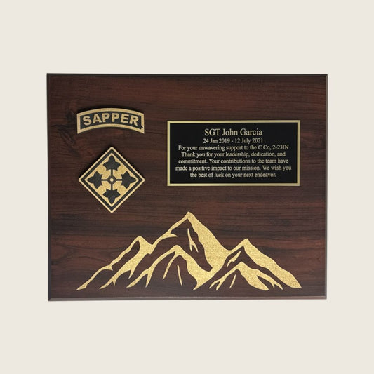 Engraved plaque with 4ID and Sapper insignias as wood coins