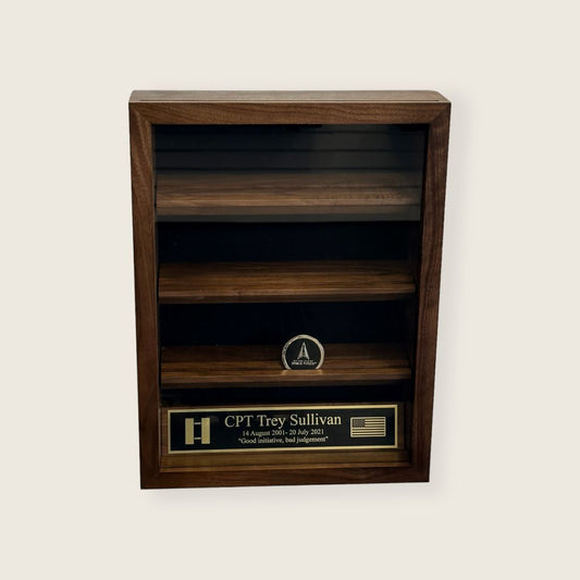 Coin display case with glass front. Space force military coin and black and gold engraved plate displayed inside